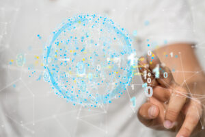 A person presenting a 3D render of cloud computing elements